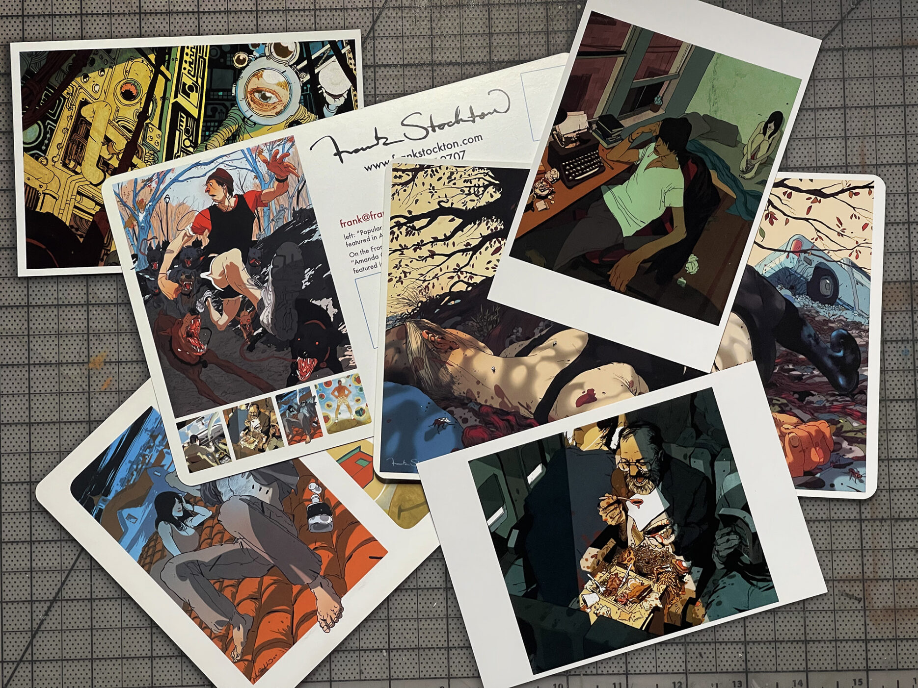 a spread-out stack of promotional mailer postcards