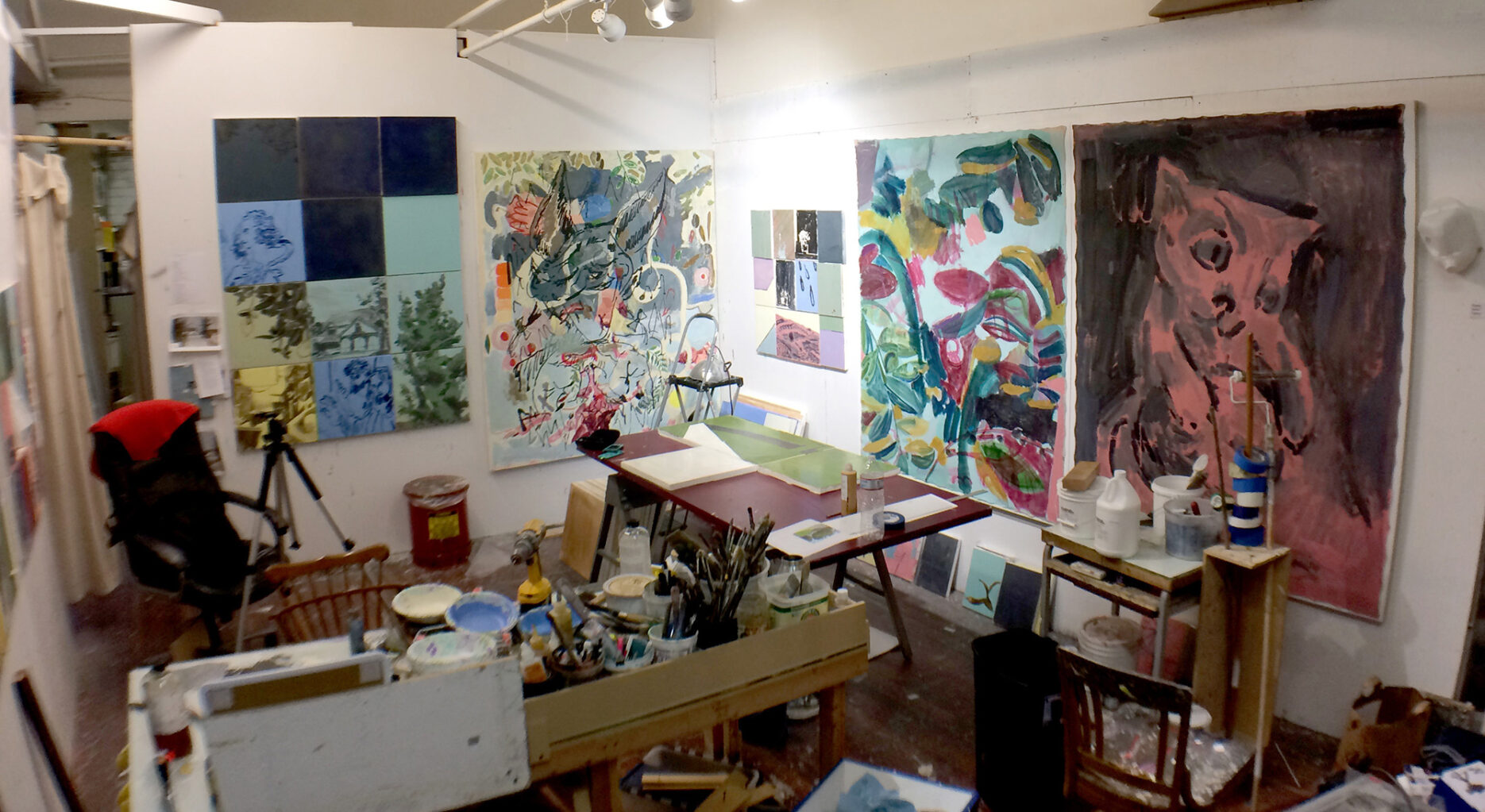 wide-angle shot of a messy art studio in Los Angeles, CA.